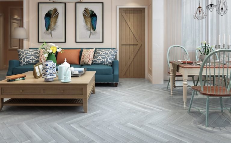 Authentic herringbone laminate flooring in grey wash