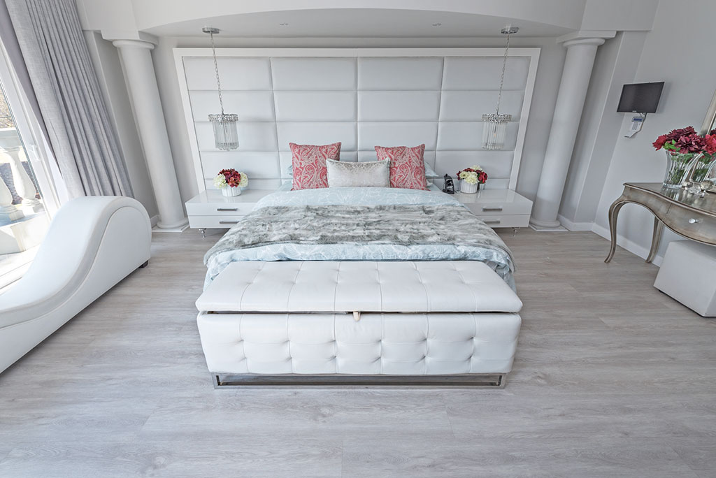 Light Alabaster diamond core vinyl flooring in a relaxing calming bedroom setting