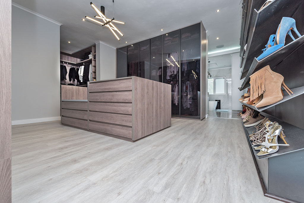 Light Alabaster diamond core vinyl flooring in a built in wardrobe