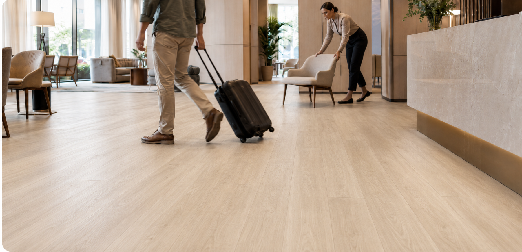 Laminate vs LVT commercial flooring durability in a high-traffic hotel lobby.